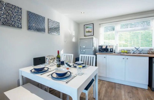 Pembroke House | Charming Beach Chalet with Balcony & Sea Views