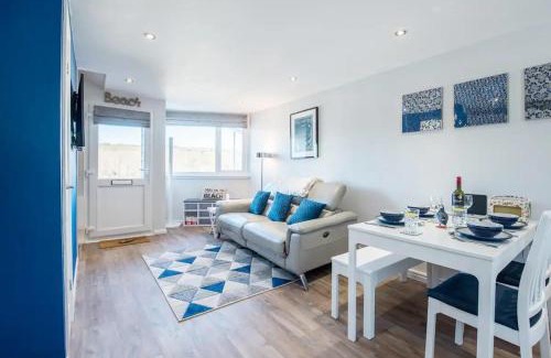 Pembroke House | Charming Beach Chalet with Balcony & Sea Views