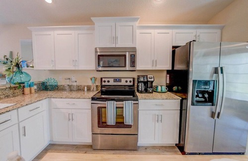 Palm Coast House | Charming Beachside Home Heated Pool Free Golf Cart