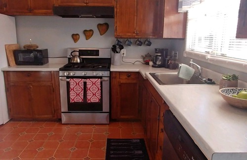 Montrose House | Charming Blue Bungalow Downtown Historic Montrose