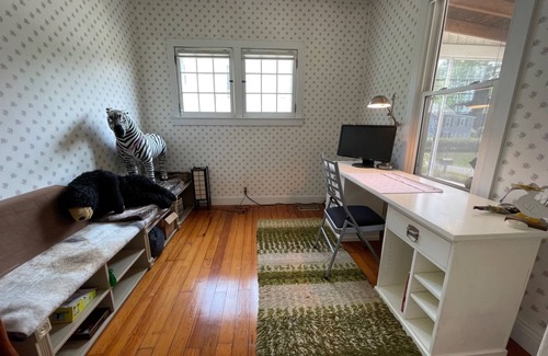 Titusville House | Charming bungalow in historic Titusville with screened in porch.