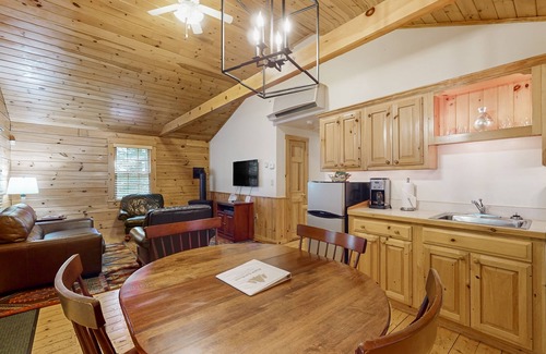 Northport Cabin | Charming cabin retreat with fireplace, kitchen, pool table & gym - dog-friendly