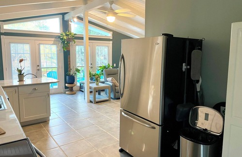 Butler Beach House | Charming Canal Front Cottage! Walk to the Beach!