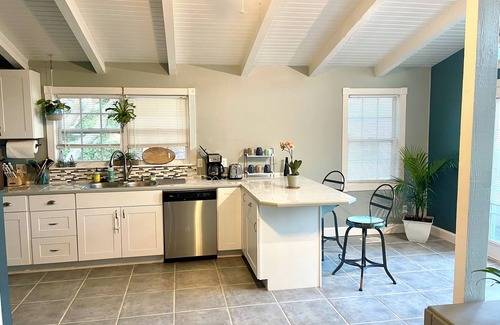 Butler Beach House | Charming Canal Front Cottage! Walk to the Beach!