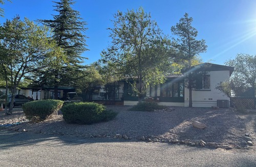 Prescott Cottage | Charming Casita with a fireplace, and a private patio and golf course views.