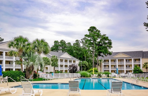 Waterford Plantation Condo | Charming condo near the beach with pool, golf, balcony, & washer/dryer