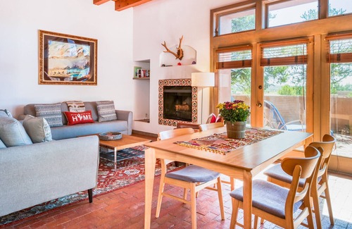 Nambe Pueblo Apartment | Charming condo with fireplace, patio, grill, W/D, & pool - quiet location