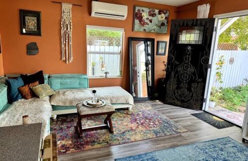 City Heights House | Charming Cottage with Hot Tub in Secret Garden