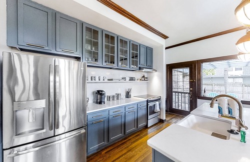 Eastwood Cottage | Charming cottage with pool, patio, central AC & fitness area