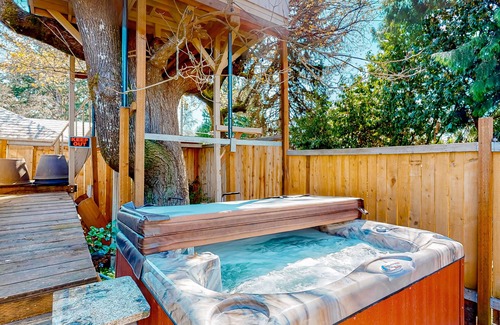 West Slope Cottage | Charming cottage with a private hot tub, gas grill, & furnished patio