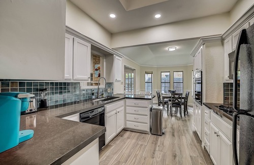Round Rock House | Charming, dog-friendly home with fireplace, patio, central AC, & washer/dryer