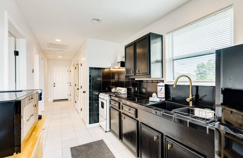 San Jacinto House | Charming dog-friendly rental with peekaboo ocean view & 1 block from beach