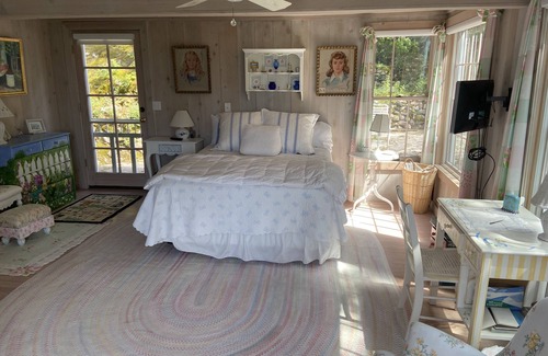 Menonaqua Beach Cottage | Charming Harbor Springs cottage right on the sandy beach and crystal water
