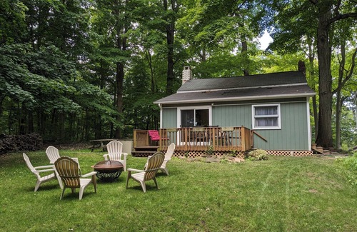 Sodus Point Cottage | Charming Island cottage with dock, accessible by car and boat