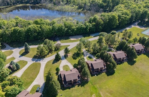 Baileys Harbor Condo | Charming Lakefront 2BR Condo: Fireplace & Balcony at The Rushes