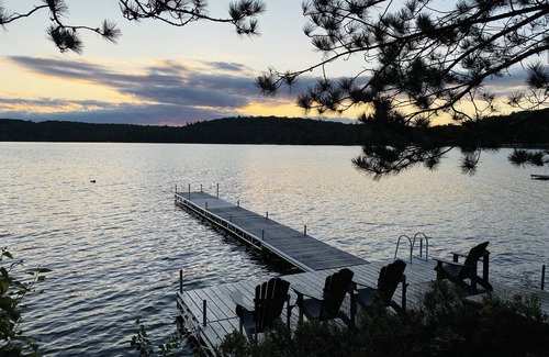 Dwight Cottage | Charming lakefront cottage with private dock, stunning sunsets & cozy wood stove