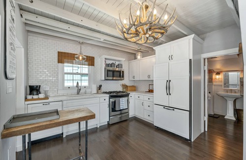 Weirs Beach House | Charming Lakefront Cottage Nearby to the Weirs with dock and sand beach