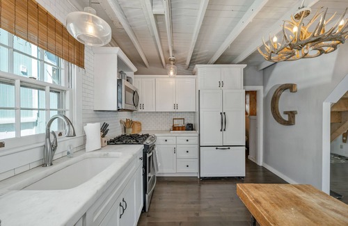 Weirs Beach House | Charming Lakefront Cottage Nearby to the Weirs with dock and sand beach