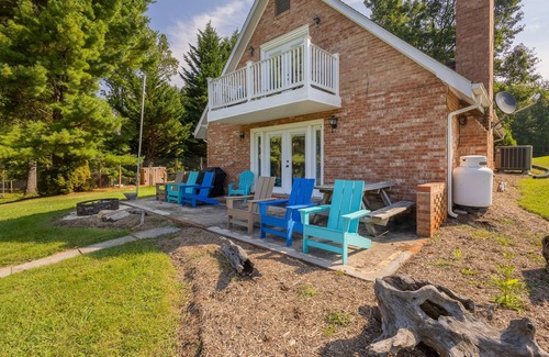 Ingles House | Charming lakefront retreat with cozy interiors, private dock, fire pit, and breathtaking water view