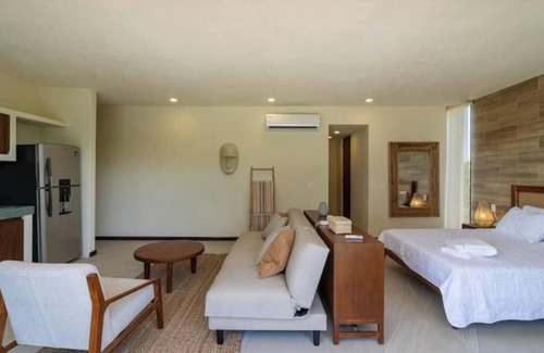 Isla Holbox Apartment | Charming Loft, Steps from the Beach & Pool View- D101
