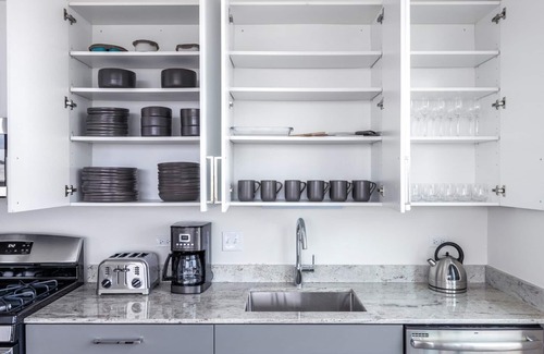 Logan Square Apartment | Charming Logan Square 2BR w/Gym, Roof Deck, 1 block to L, by Blueground