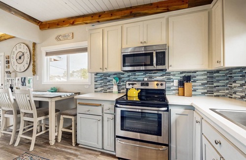 Rockaway Beach House | Charming, modern home close to the beach with full kitchen, WiFi, & large deck