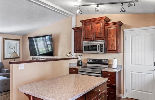 Millcreek House | Charming Mountain Retreat with Enclosed Backyard and Artistic Flair