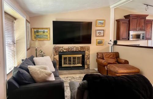 Millcreek House | Charming Mountain Retreat with Enclosed Backyard and Artistic Flair