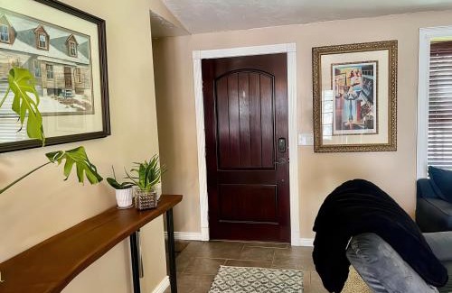 Millcreek House | Charming Mountain Retreat with Enclosed Backyard and Artistic Flair