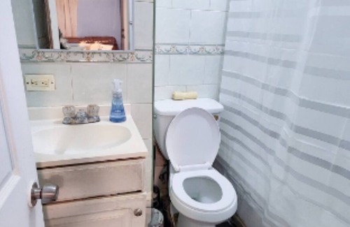 Queens Apartment | Charming Oasis Steps from Beach & Metro Station