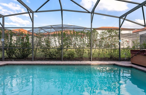 Four Corners House | CHARMING OASIS VILLA NEAR DISNEY WITH POOL, BBQ, AND OUTDOOR ADVENTURES