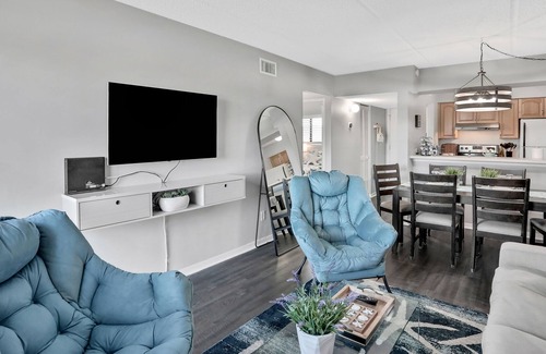 Neptune Beach Condo | Charming ocean view condo with kitchen, balcony & beach towels - close to beach