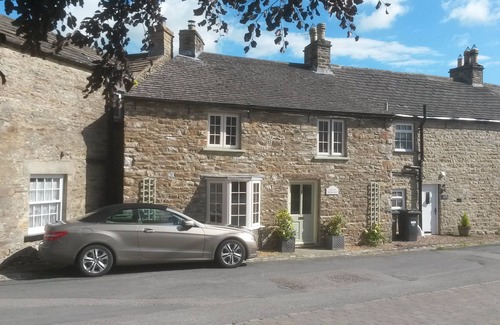 Redmire Cottage | Charming old stone Dales cottage in Redmire with stunning views of Penn Hill