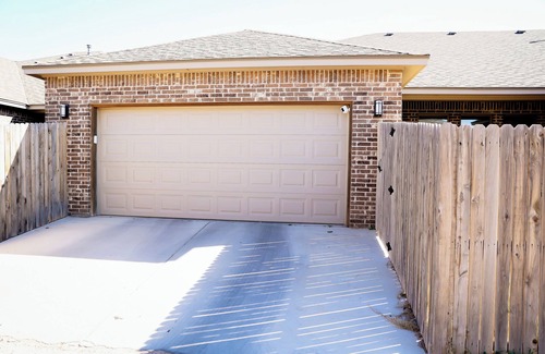 Midland House | Charming retreat nestled in a peaceful neighborhood & conveniently located!