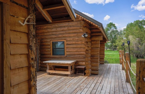 Dubois Cabin | Charming riverfront 2-bedroom cabin in enchanting Dubois with WiFi