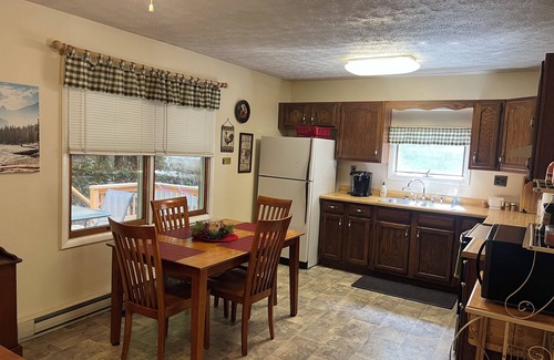 Elkins House | Charming riverfront home with beautiful views, hot tub and game room. Fishing!