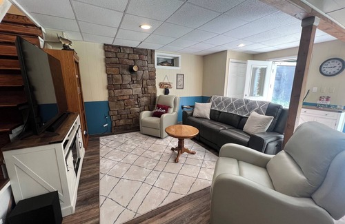 Elkins House | Charming riverfront home with beautiful views, hot tub and game room. Fishing!