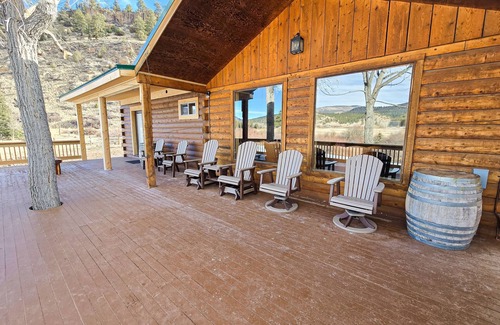 Rio Vista Estates House | Charming riverfront cabin with hot tub, fireplace, and stunning outdoor views