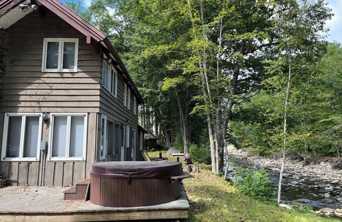 Jamaica Cabin | Charming riverside cabin in Jamaica, VT with hot tub