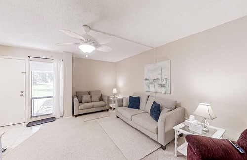 Ormond Beach Condo | Charming sunlit beach condo with pool, patio, W/D, AC, and wonderful ocean views