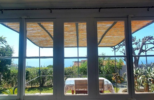 Estreito da Calheta House | Charming three bedroom cottage with a pretty garden and free private parking