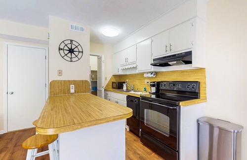Brandy Wine Village South House | Charming townhome with patio, W/D, central AC, close to beach & golf