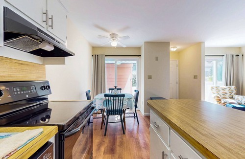 Brandy Wine Village South House | Charming townhome with patio, W/D, central AC, close to beach & golf