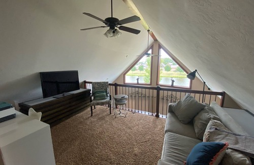 Arnolds Park House | Charming upscale vacation cottage on the pond in the Bridges Bay Resort property
