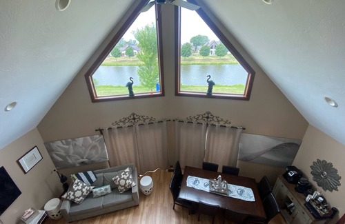 Arnolds Park House | Charming upscale vacation cottage on the pond in the Bridges Bay Resort property