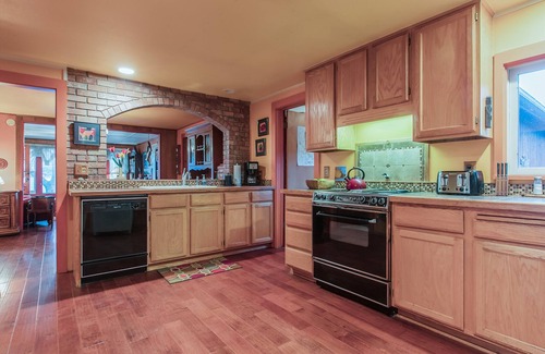Big Arm House | Charming waterfront home w/ private hot tub & dock - space over garage