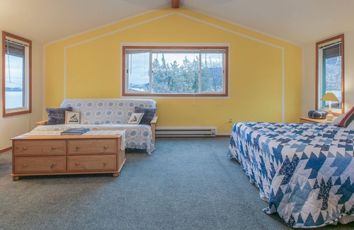 Big Arm House | Charming waterfront home w/ private hot tub & dock - space over garage