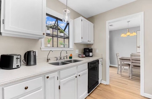 Crescent Beach House | Check out our PET FRIENDLY 3-bed, 2-bath cottage retreat in North Myrtle Beach, SC with a spacious fenced-in yard!