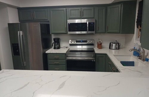 Swiss Manor House | ✓ Cheerful 4 bed/4 bath home w/large patio & yard