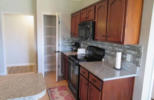 Southaven House | Cheerful 4 Bedroom with indoor fireplce, Fence in yard, Screen in back deck,